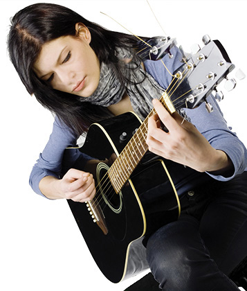 woman playing guitar